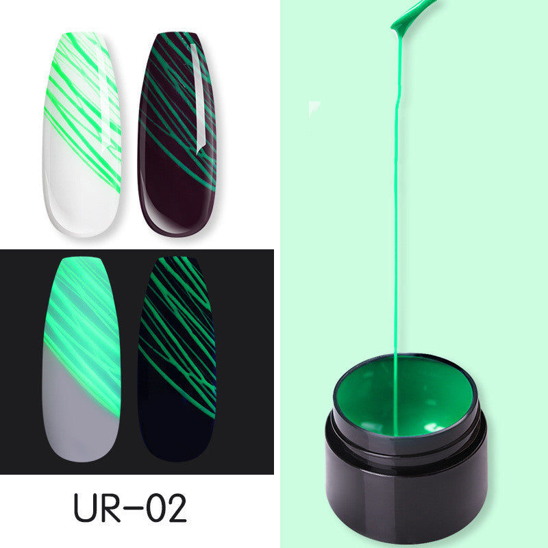a close-up of a jar of green nail polish