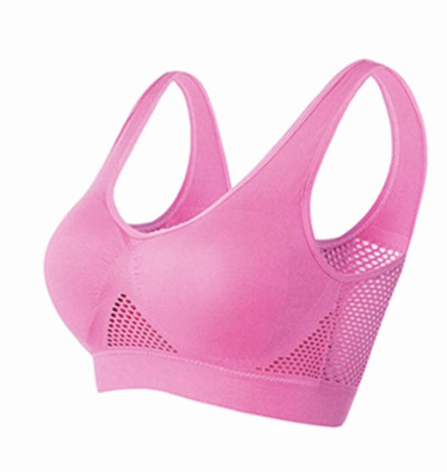 a pink sports garment with mesh inserts