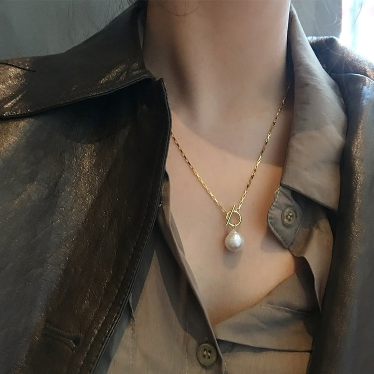 a woman wearing a necklace