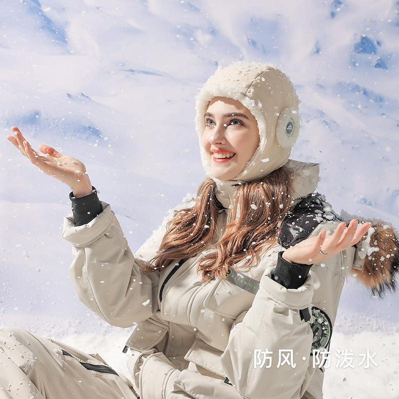 a woman in a snow suit