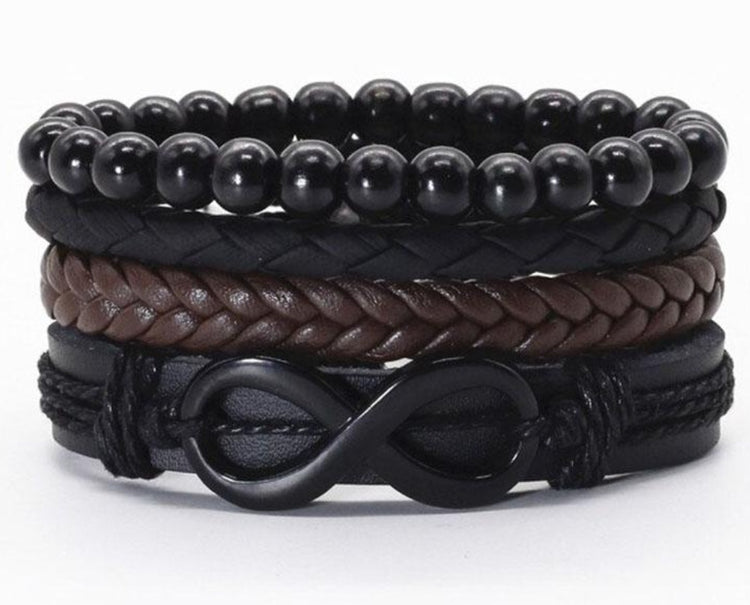 a stack of black and brown leather bracelets