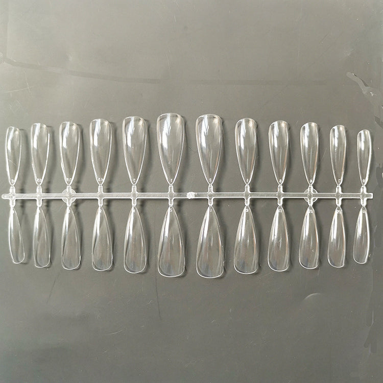 a row of clear plastic nails