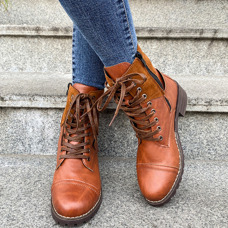 a person's legs and boots