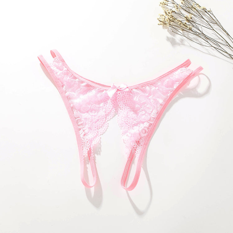 a pink underwear and dried flowers
