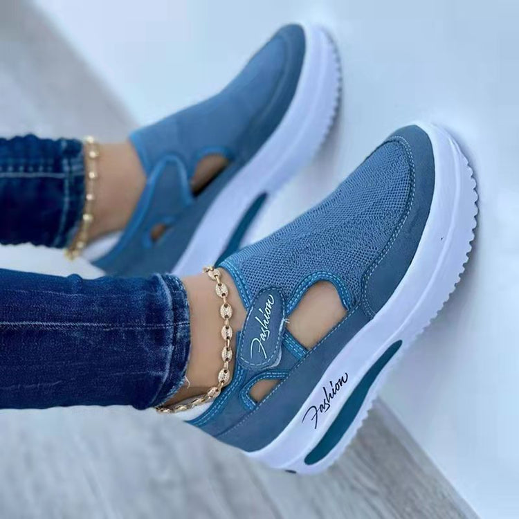 a person wearing blue shoes