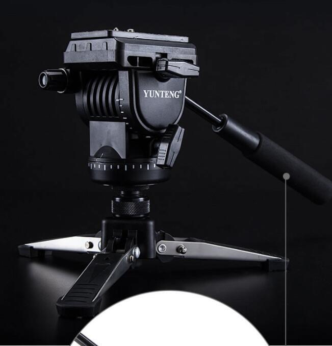 a black camera on a tripod