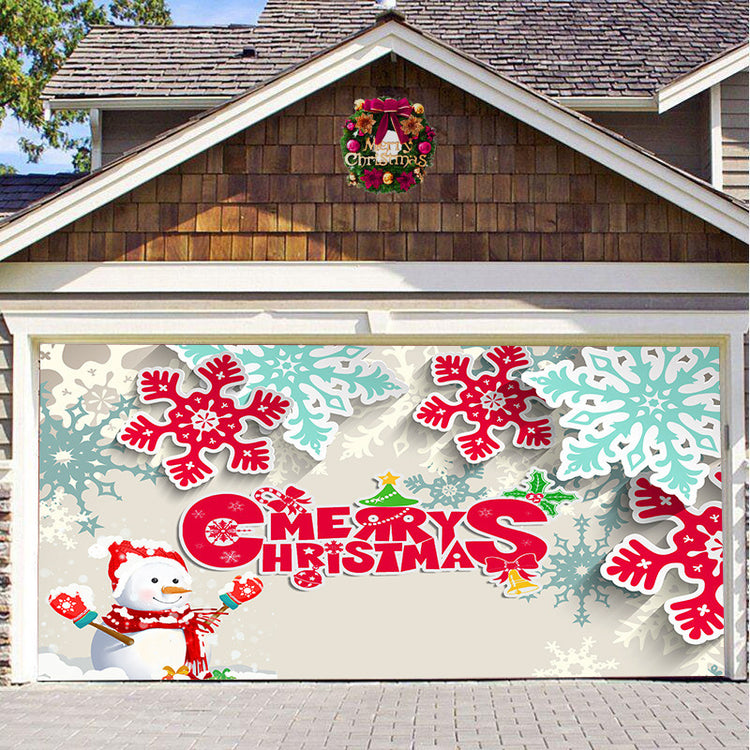 a garage door with a snowman and snowflakes