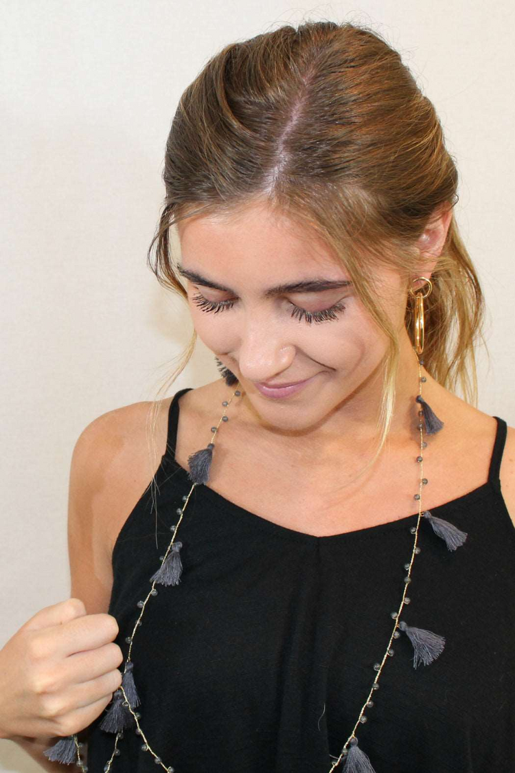 a woman wearing a black dress