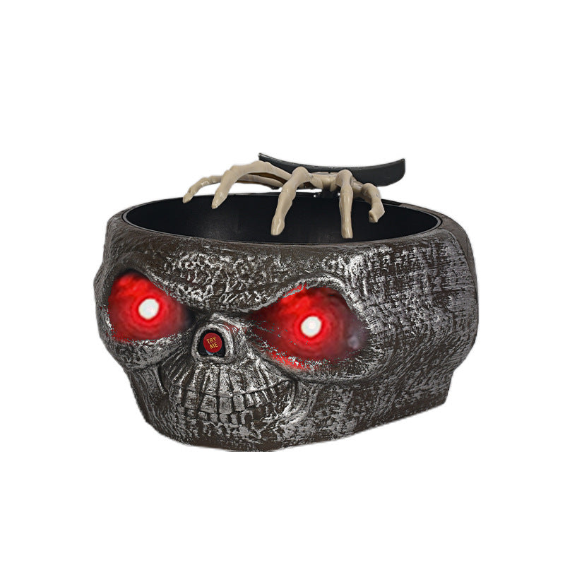 a bowl with a skull and red eyes