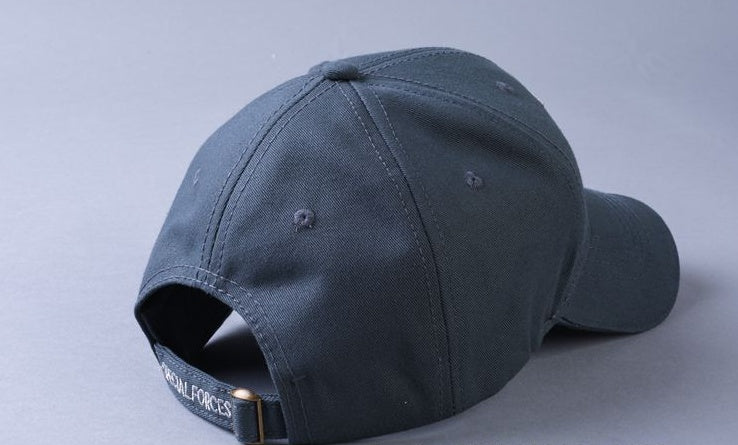 a black baseball cap with a logo on it