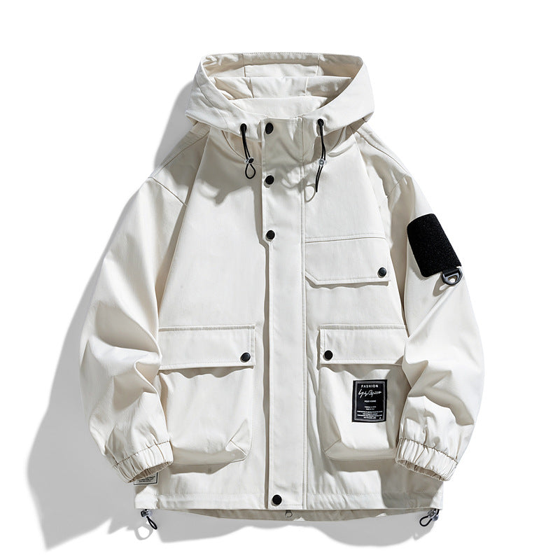 a white jacket with black patches