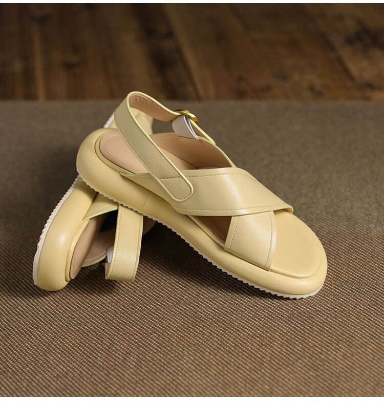 a pair of tan sandals