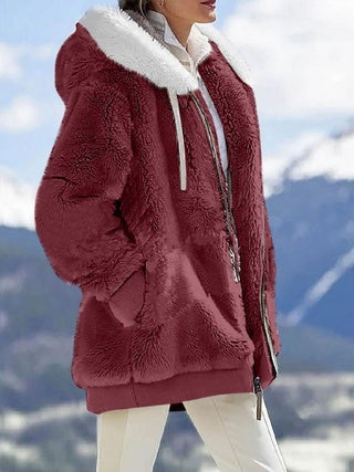 a woman in a red coat
