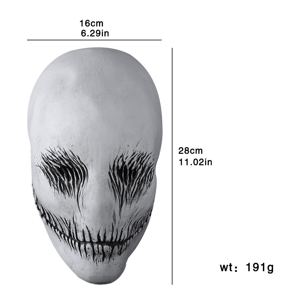 a white mask with black lines on it