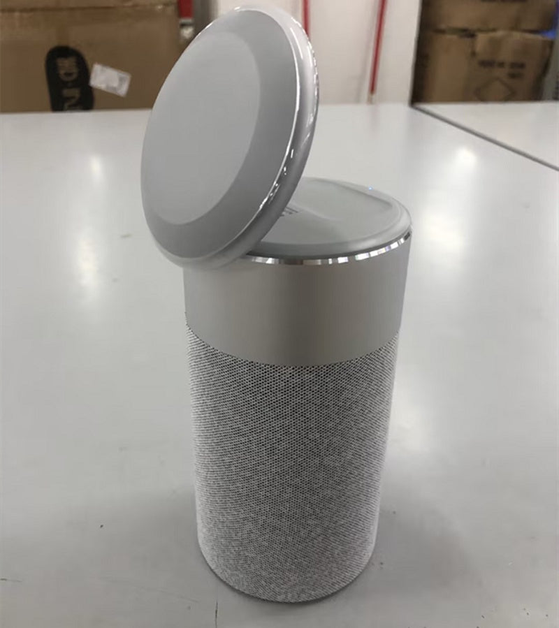 a white speaker with a lid