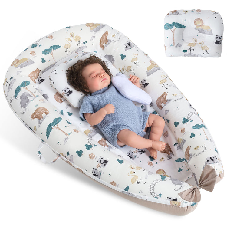 a baby sleeping in a baby bed