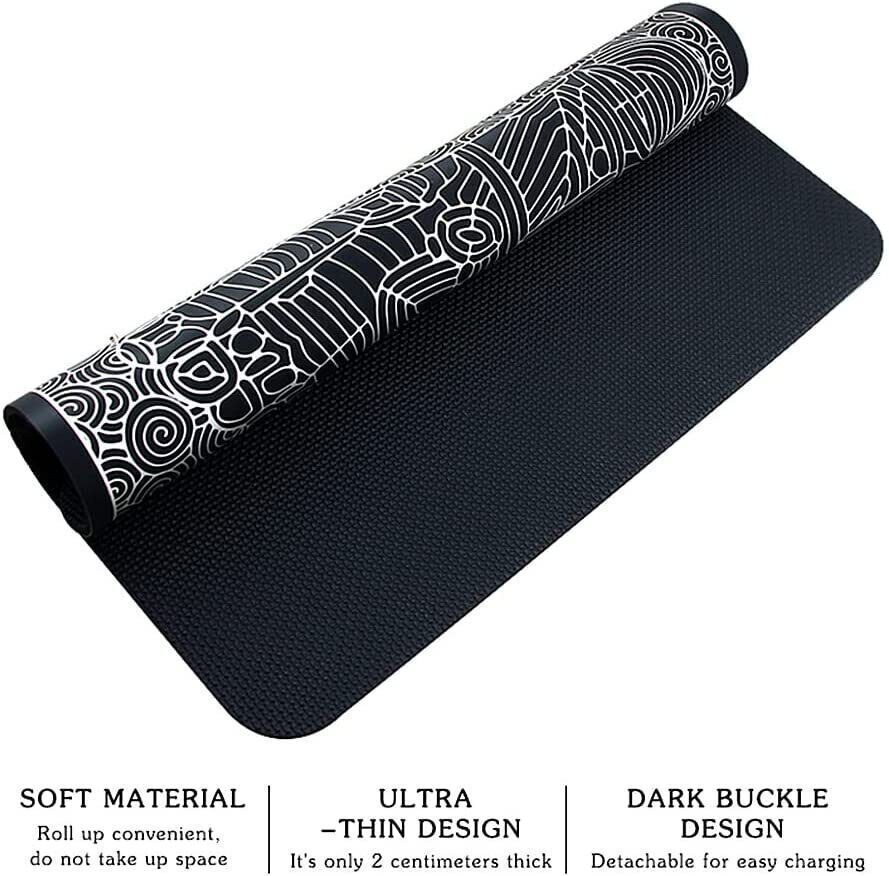 a black and white rolled up mat