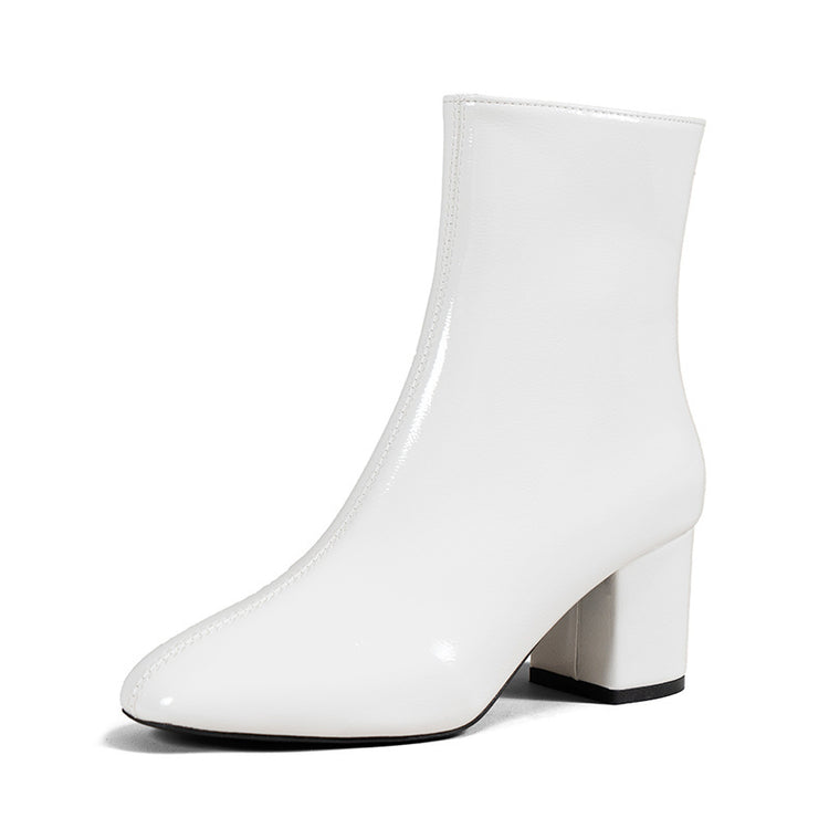 a white boot with a high heel