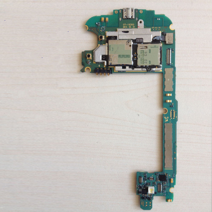 a green circuit board with many small chips