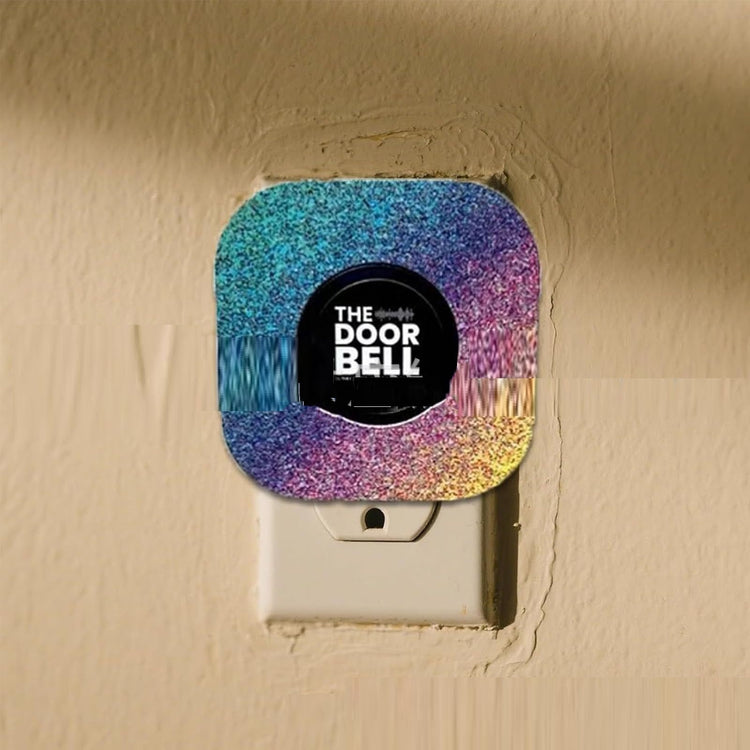 a door bell on a wall