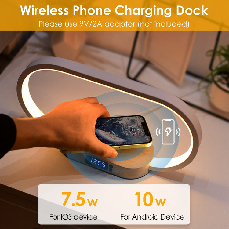 a hand holding a phone on a charging dock