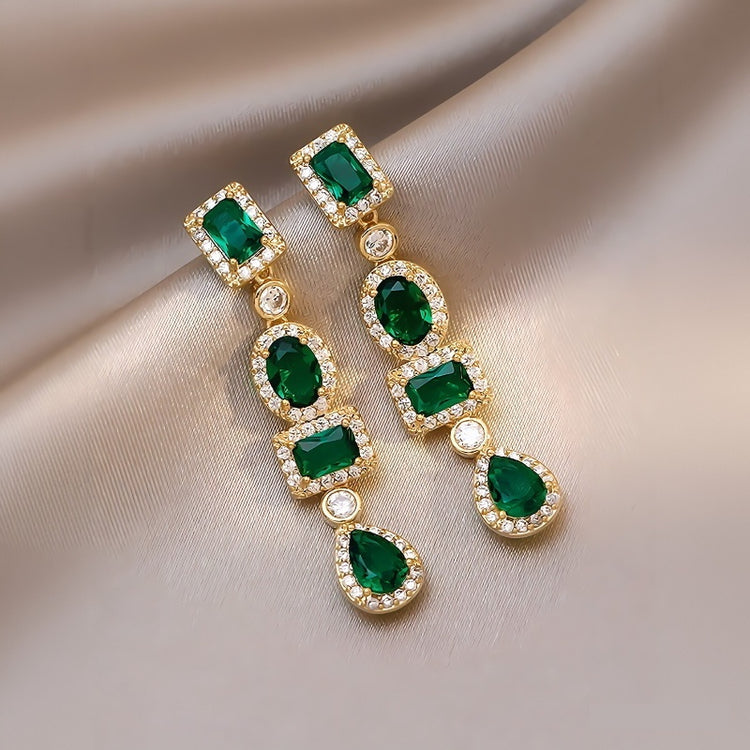 a pair of emerald earrings