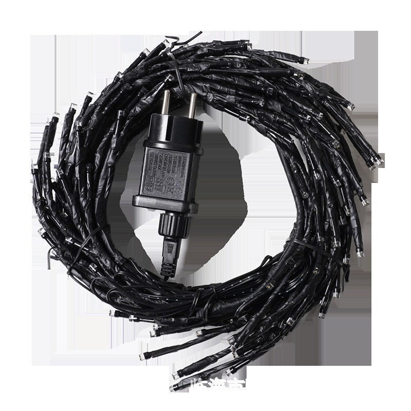 a black electrical plug and a black cable