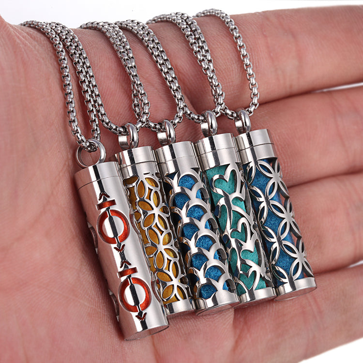 a hand holding a necklace