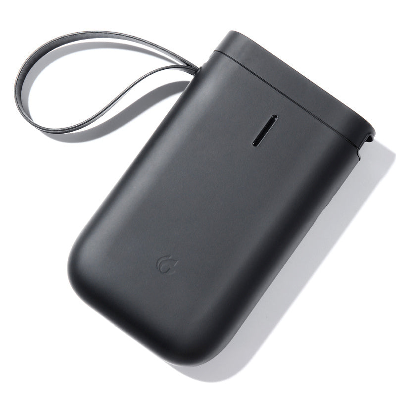 a black rectangular object with a strap