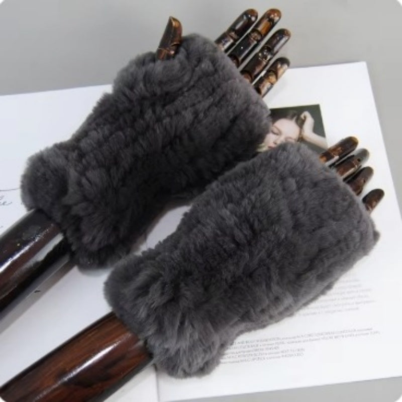 a pair of wooden hand gloves
