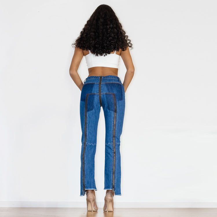 a woman in blue jeans