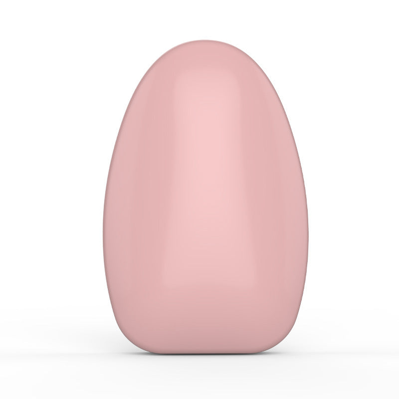 a pink oval object on a white background