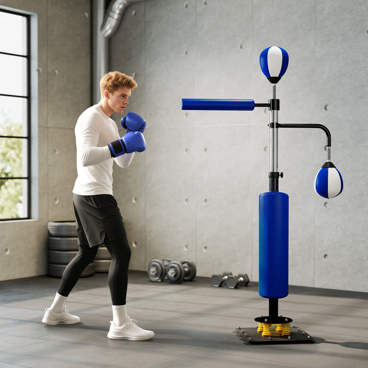 a man wearing boxing gloves and standing next to a punching bag