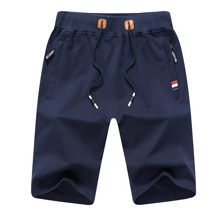 a blue shorts with a brown belt