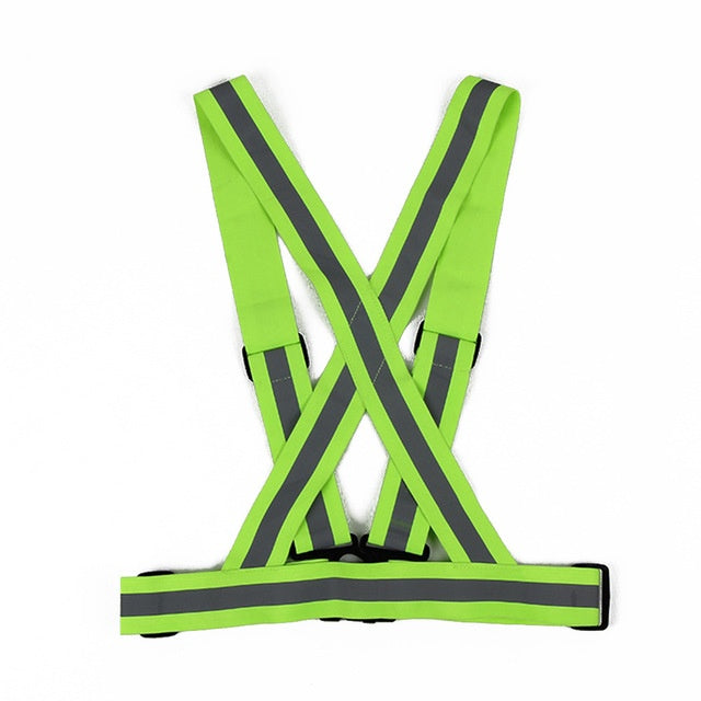 a green reflective vest with grey stripes
