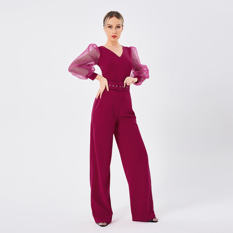 a woman in a red jumpsuit