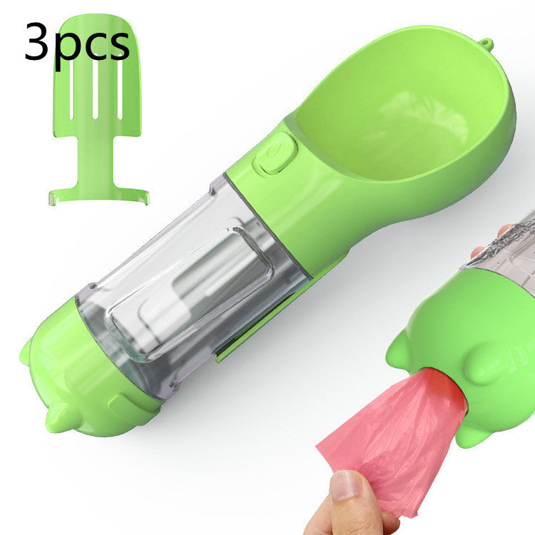 a green plastic container with a plastic bag being poured into it