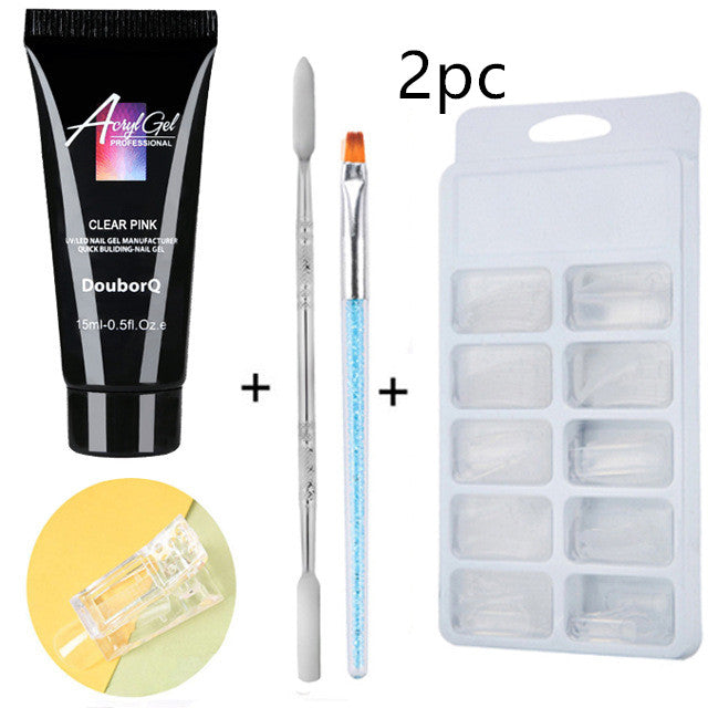 a black tube of gel and a brush
