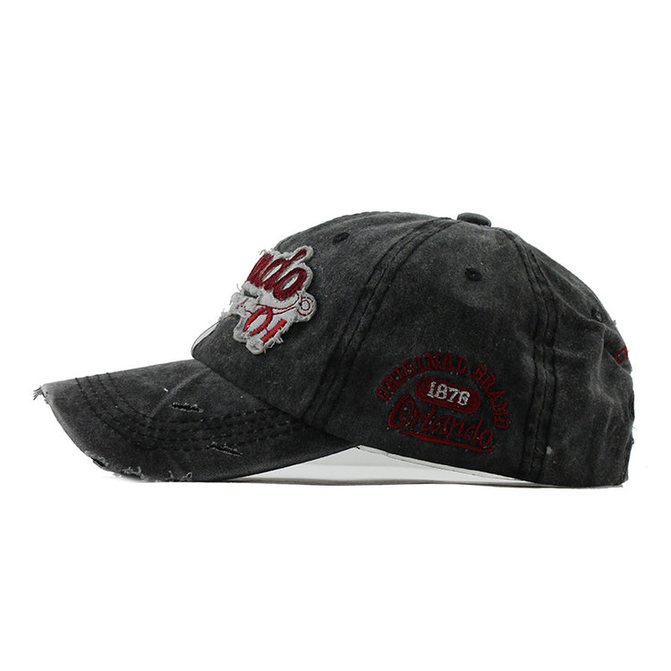 a black baseball cap with red and white text