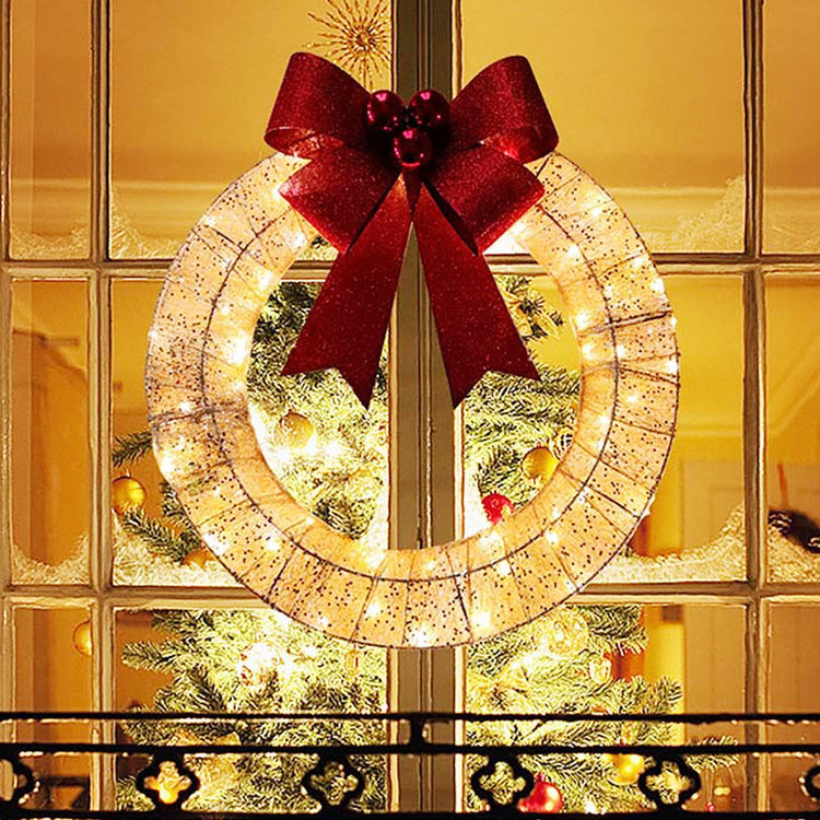 a christmas wreath with a bow