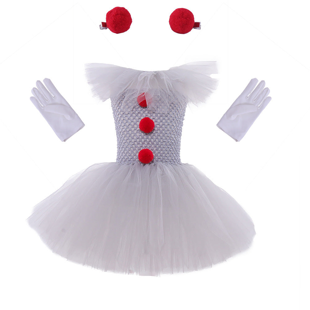 a garment with red balls and gloves