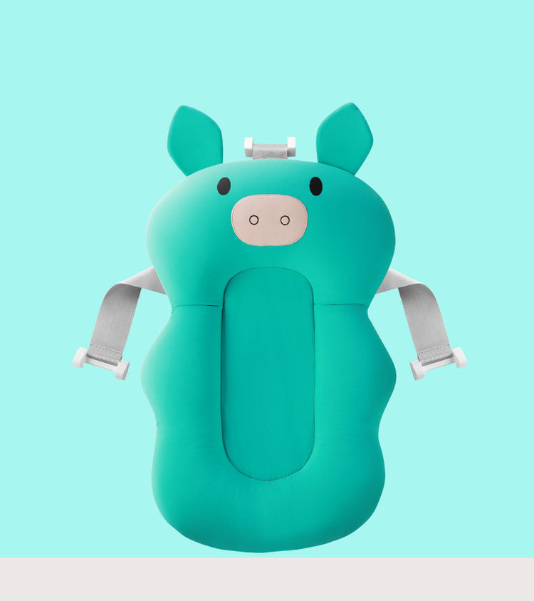 a blue pig shaped pillow