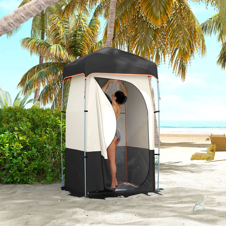a woman in a shower on a beach