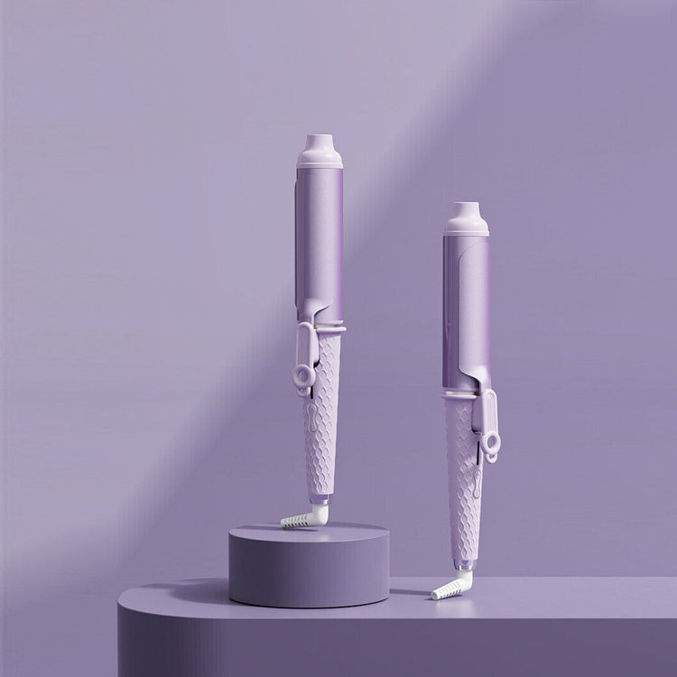 a pair of purple hair curlers on a round platform