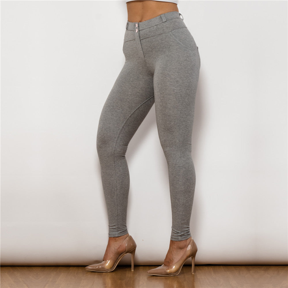 a woman wearing tights and heels