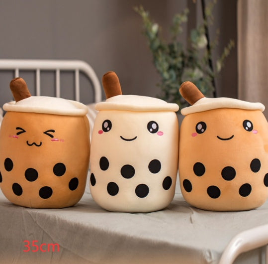a group of soft toys on a table