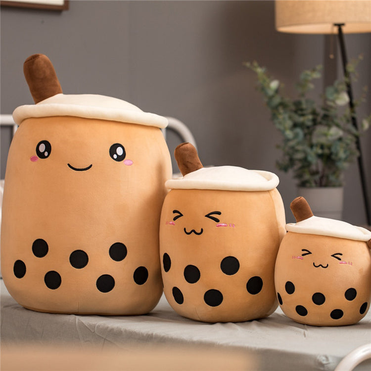 a group of soft toys on a table
