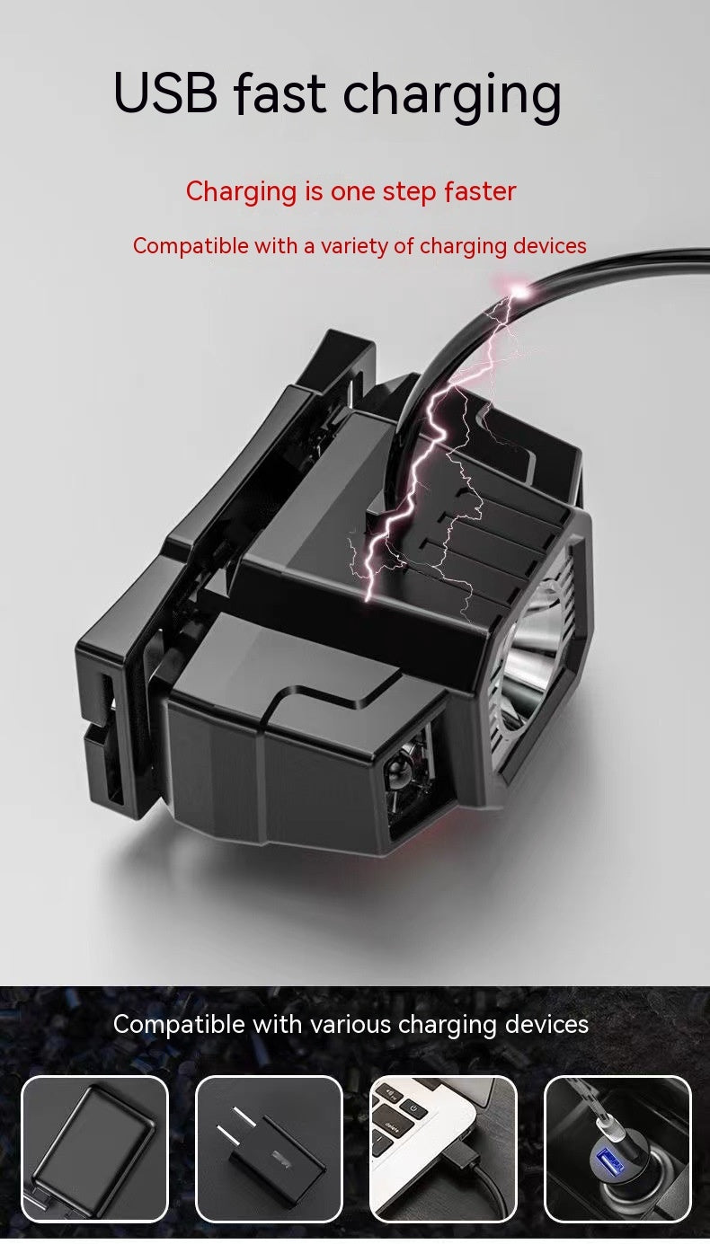 a black rectangular object with a light coming out of it