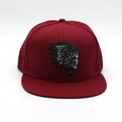 a red hat with a black and white skull on it