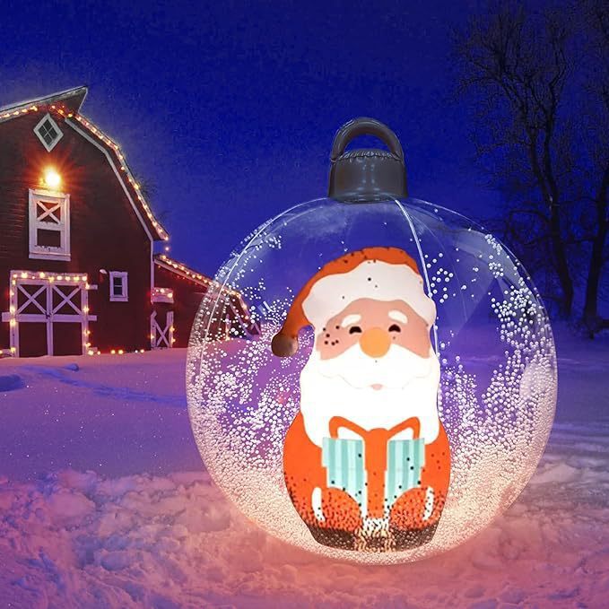 a christmas ornament in a snow covered yard